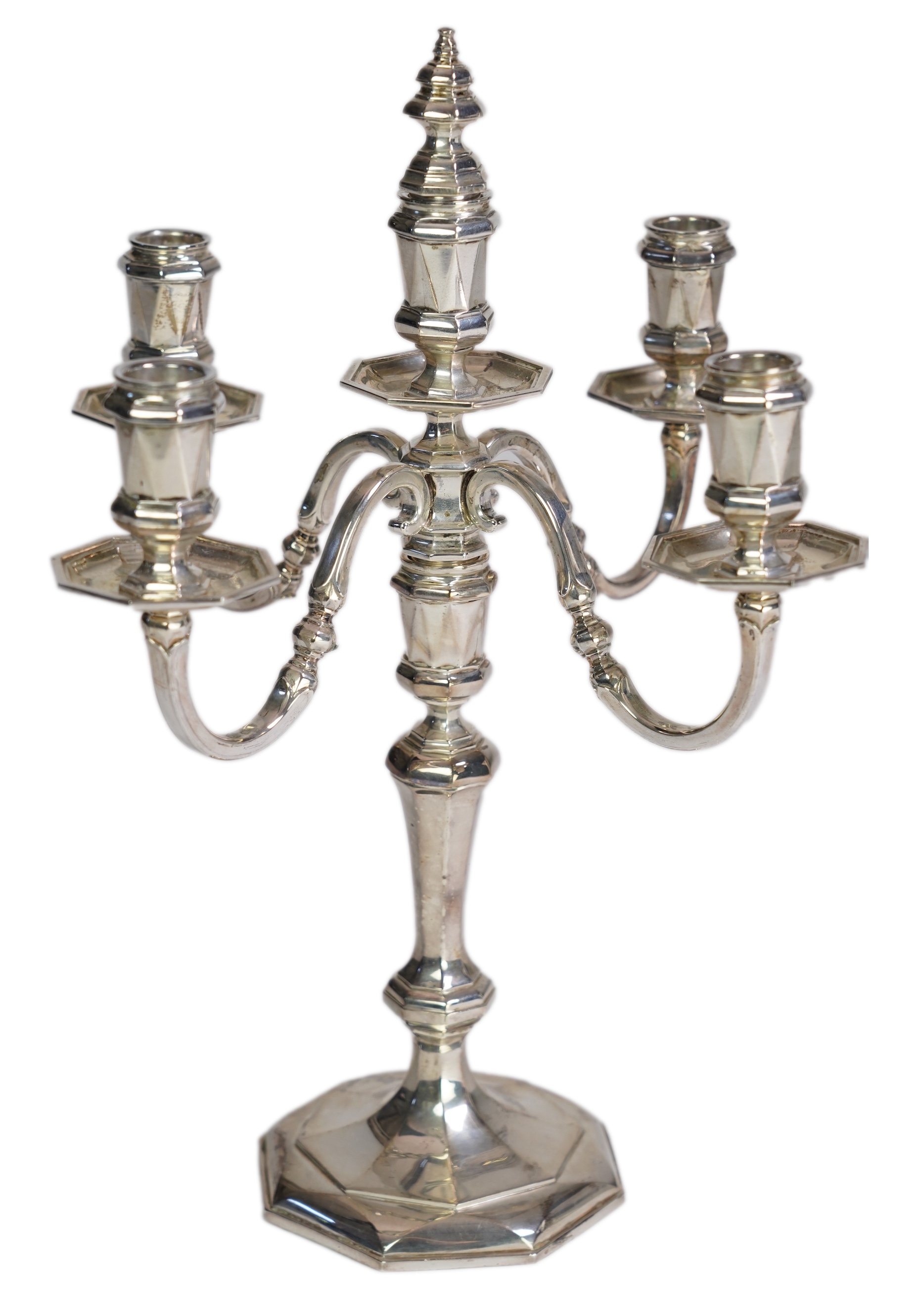 An Elizabeth II silver four branch, four light candelabrum by William Comyns & Sons Ltd